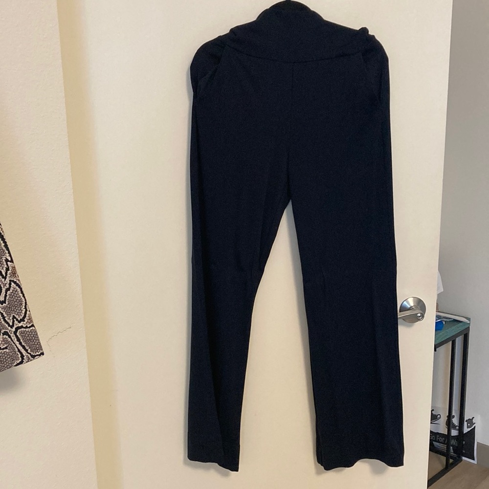 Very high waisted blue soft slack like bell bottom pants.